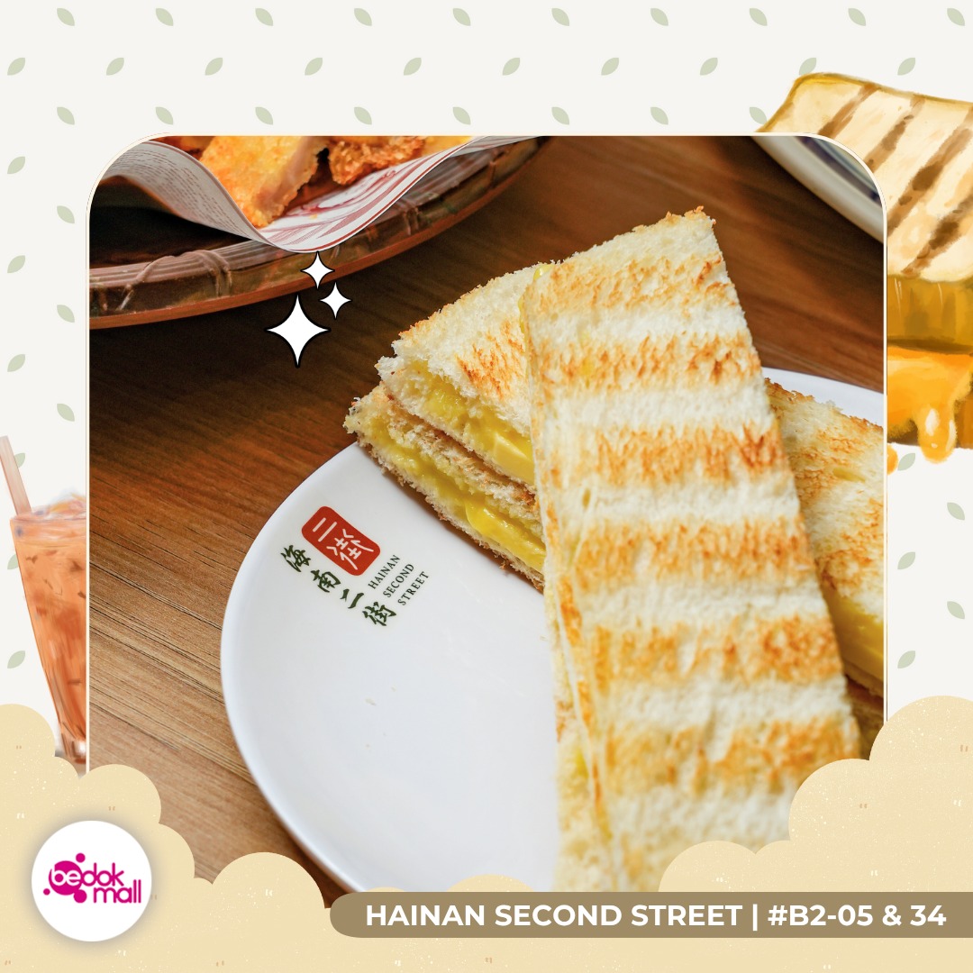 Perfectly cooked, tender Hainanese Chicken with garnishes