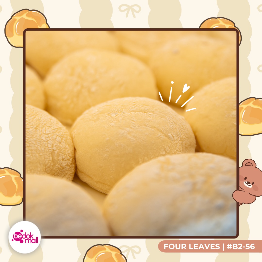 Variety of sweet and savory buns displayed at Four Leaves