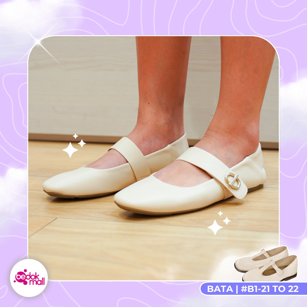 Stylish pair of black high heels with a modern design.