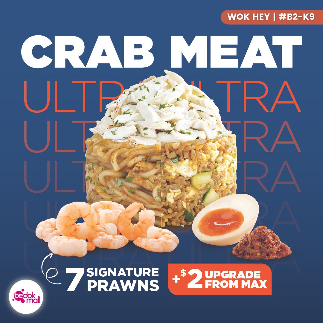 WOK HEY Laksa featuring succulent crab meat and tender prawns