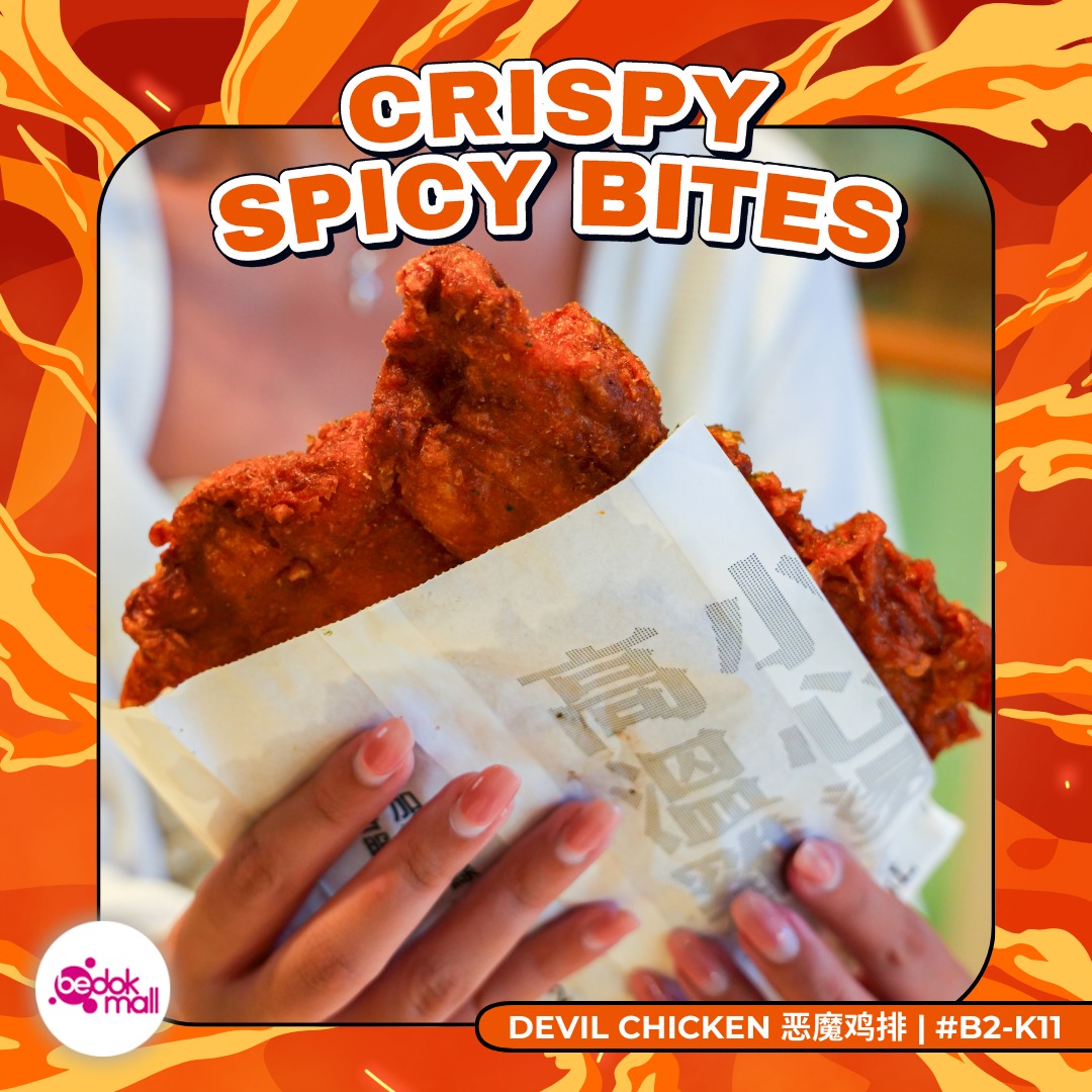 A large, golden-brown chicken cutlet ready to be served