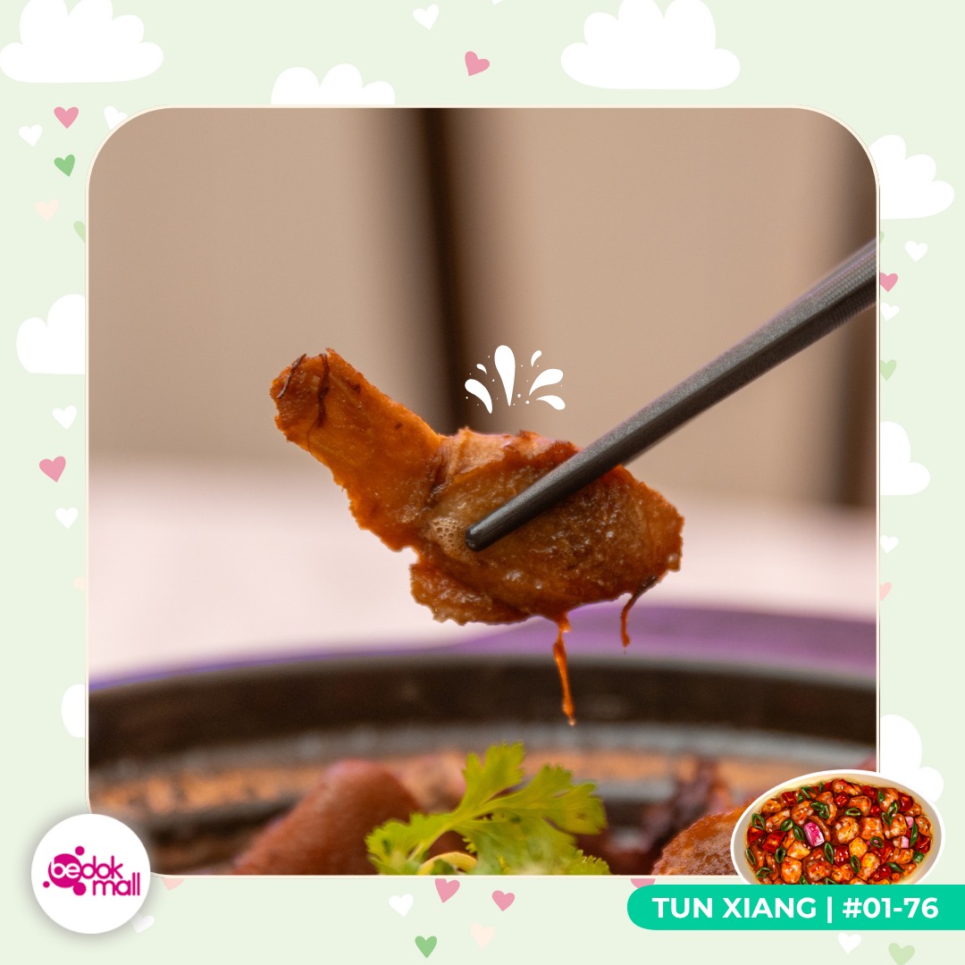 Crispy Sweet and Sour Pork with vibrant sauce and vegetables.